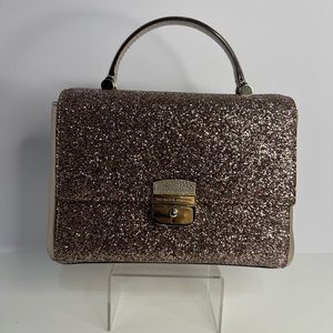 Kate Spade Holiday Edition crossbody. Never been worn. Comes with dust bag